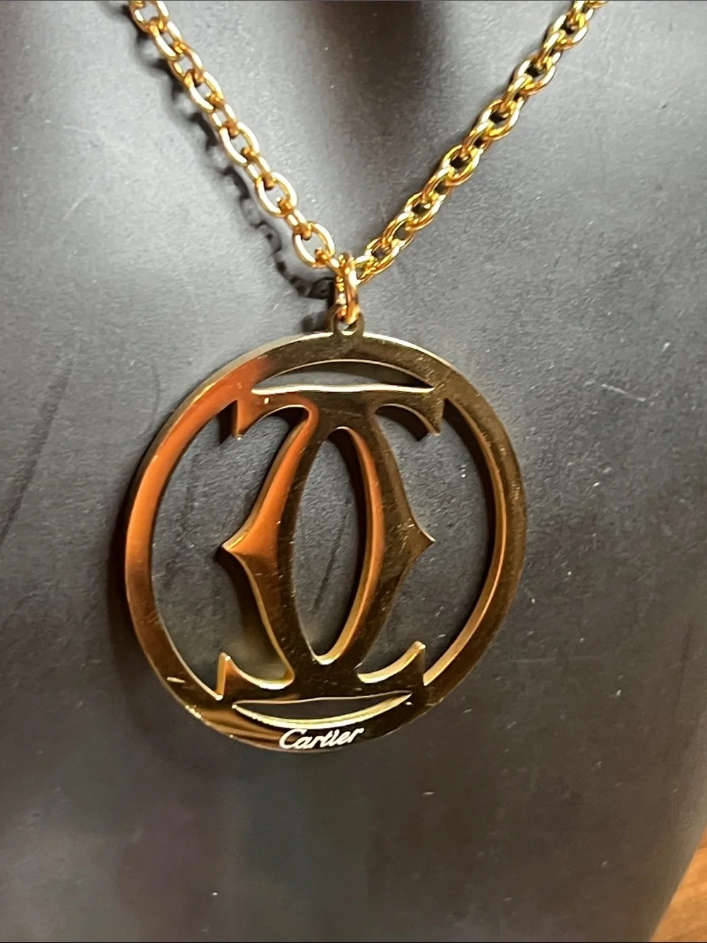 Gold and Black Circular Logo Pendant Necklace